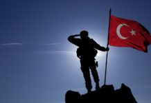 Più tasse, più armi Turkish flag