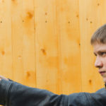 Boy with gun