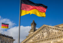 I dati sulle esportazioni di armi tedesche: la polemica delle opposizioni bandiera tedesca sul Bundestag: armi tedesche