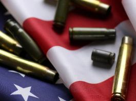 Bump stock: il flop della consegna nel Vermont prima che diventassero illegali American flag with bullets