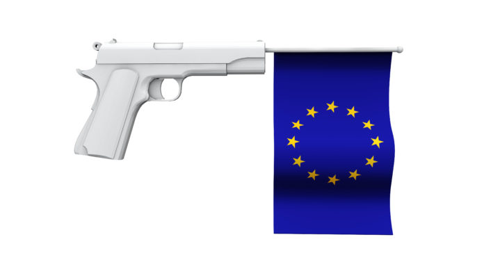 Ricorso della Repubblica Ceca contro la Direttiva armi: bandiera dell'Unione europea dentro una pistola