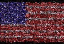 Armi vendute in America: i dati del 2019 Armi vendute in America: bandiera americana raffigurata con proiettili