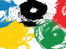 Ufficiale: niente Tokyo 2020 Tokyo 2020 rinviato: bandiera olimpica dipinta con macchie di vernice