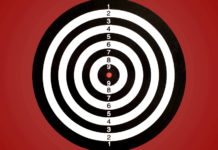 Gianfranco Mantelli si candida a presidente Uits Gianfranco Mantelli si candida a presidente Uits: bersaglio da tiro a segno su sfondo rosso