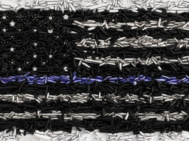 Vendita di armi negli Stati Uniti: cambio di tendenza? vendita di armi negli Stati Uniti: bandiera americana con proiettili