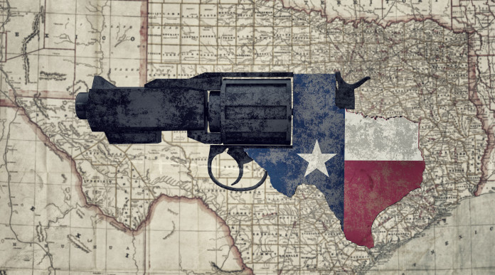 porto d'armi in Texas: revolver con bandiera americana su vecchia mappa del Texas