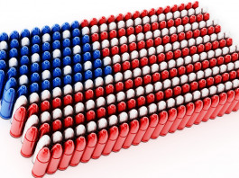 Mercato delle armi in America: ecco gli ultimi dati Mercato delle armi in America: bandiera americana realizzata con munizioni