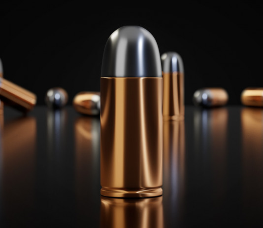 Divieto munizioni in piombo, le conseguenze socio-economiche Divieto munizioni in piombo: munizioni per pistola su fondo nero