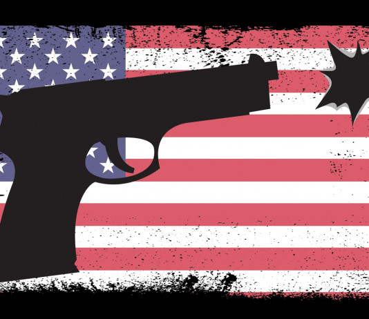 Mercato delle armi in America: la situazione a giugno Mercato delle armi in America: pistola stilizzata su sfondo di bandiera americana