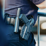 Manhattan,2019.,Behind,The,Police,With,Gun,Belt
