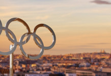 Tiro a segno e a volo a Parigi 2024: quanti italiani già qualificati? Tiro a segno e a volo a Parigi 2024: quanti italiani già qualificati? veduta di parigi, torre eiffel, con i cinque cerchi olimpici