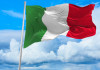 Scudetto per Grazini, Sessa, Ciccotti e Bongini Scudetto per Grazini, Sessa, Ciccotti e Bongini - bandiera italiana contro il cielo nuvoloso
